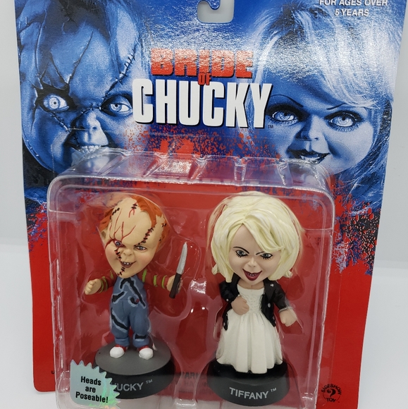 little action figures with big heads